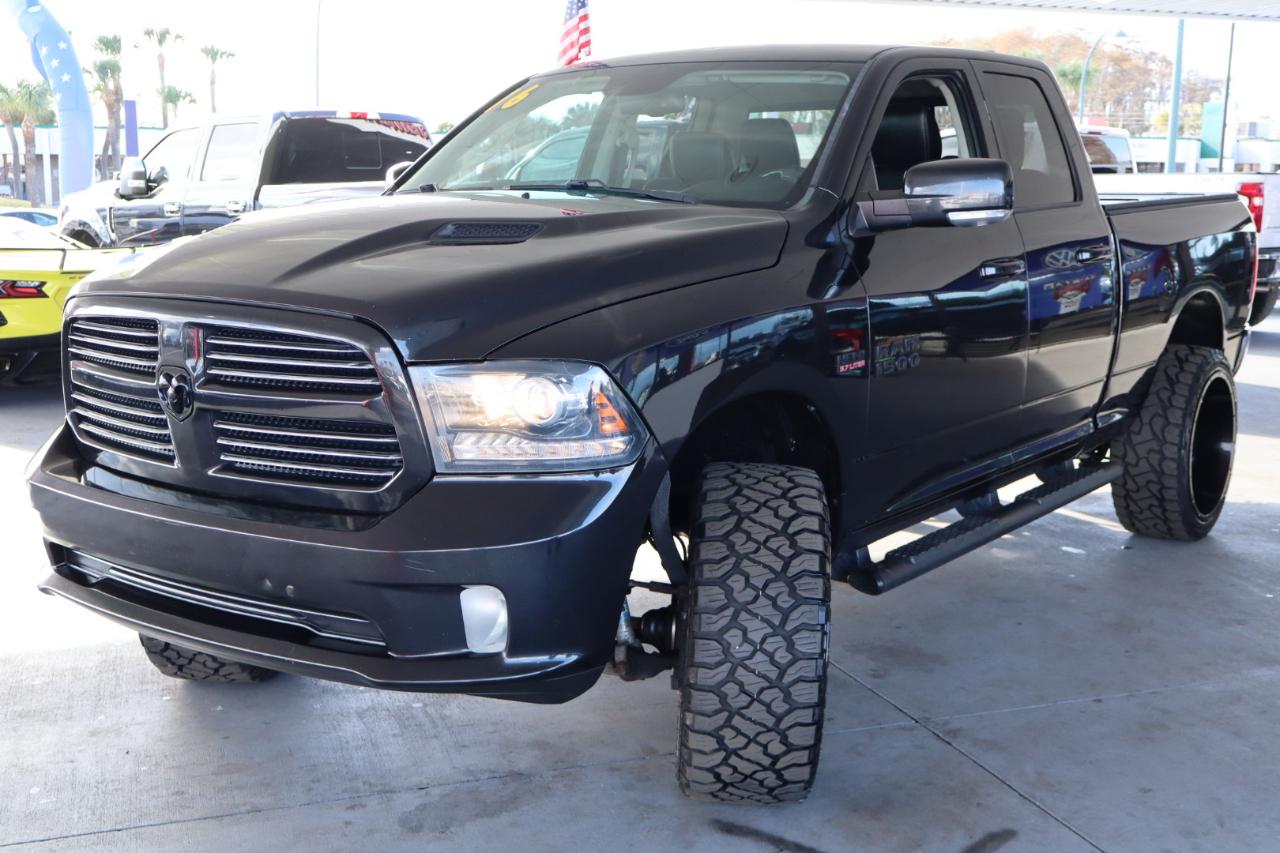 RAM 1500 4WD Quad Cab 140.5" Sport 2016