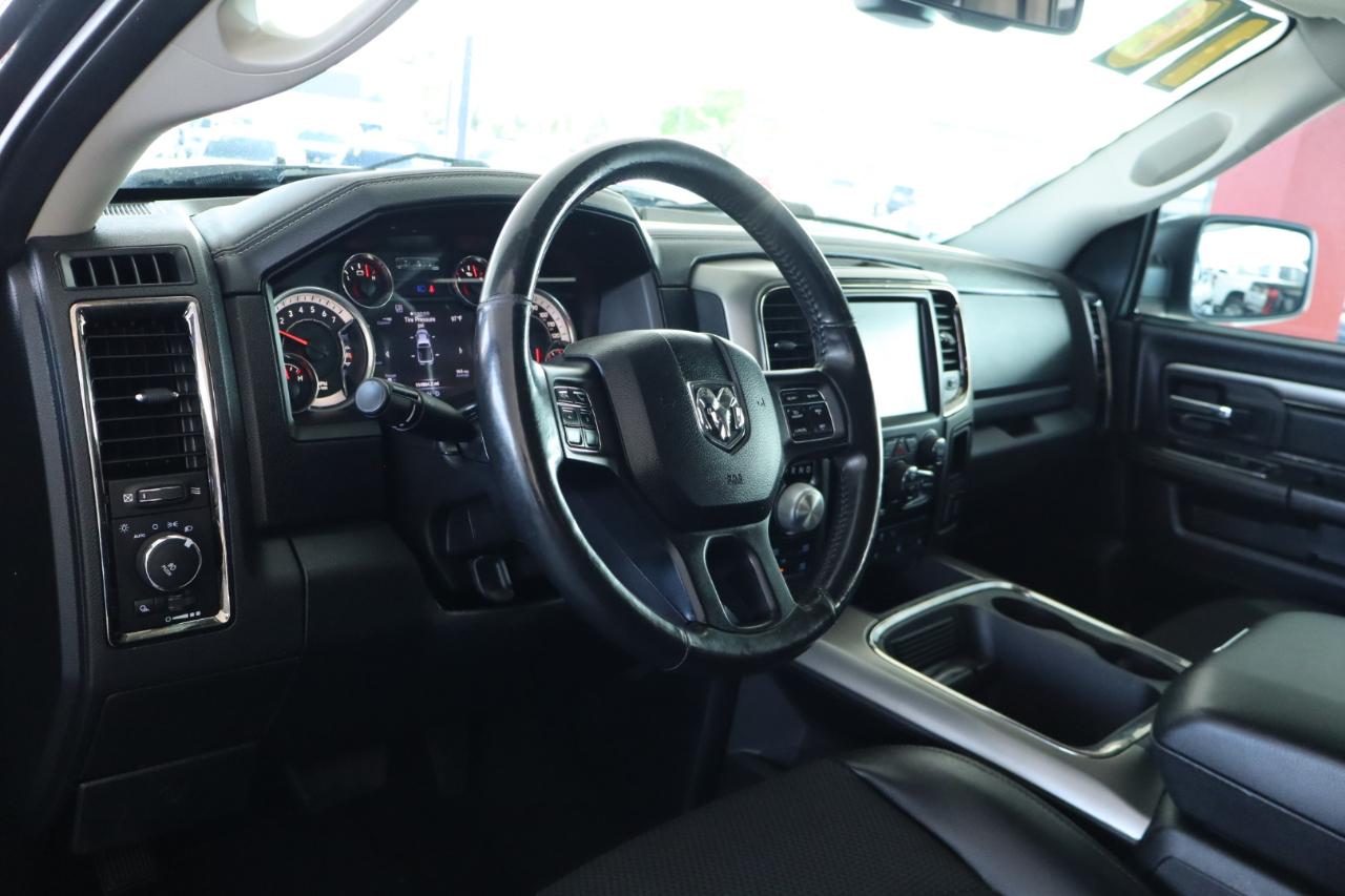 RAM 1500 4WD Quad Cab 140.5" Sport 2016