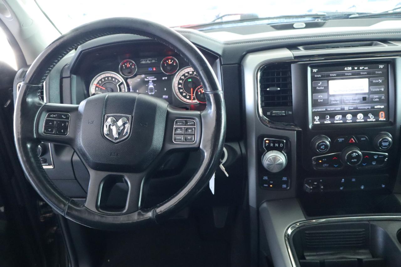 RAM 1500 4WD Quad Cab 140.5" Sport 2016