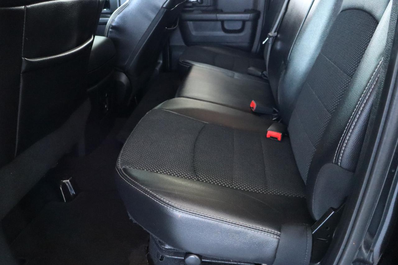 RAM 1500 4WD Quad Cab 140.5" Sport 2016