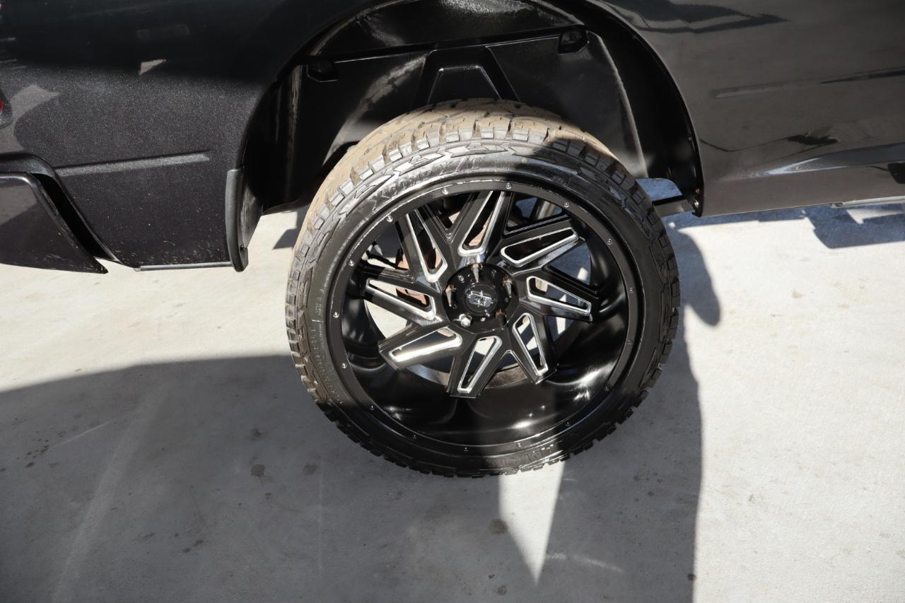 RAM 1500 4WD Quad Cab 140.5" Sport 2016