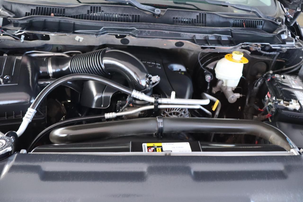 RAM 1500 4WD Quad Cab 140.5" Sport 2016