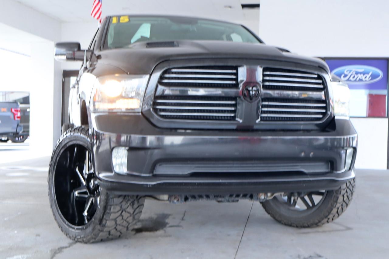 RAM 1500 4WD Quad Cab 140.5" Sport 2016