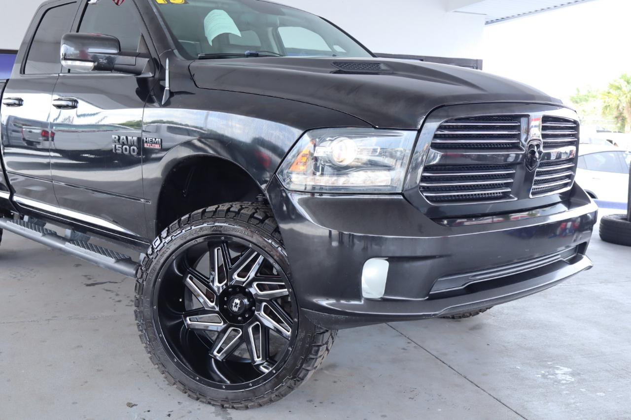 RAM 1500 4WD Quad Cab 140.5" Sport 2016