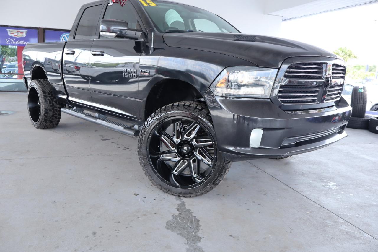 RAM 1500 4WD Quad Cab 140.5" Sport 2016