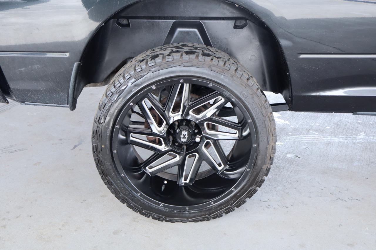 RAM 1500 4WD Quad Cab 140.5" Sport 2016