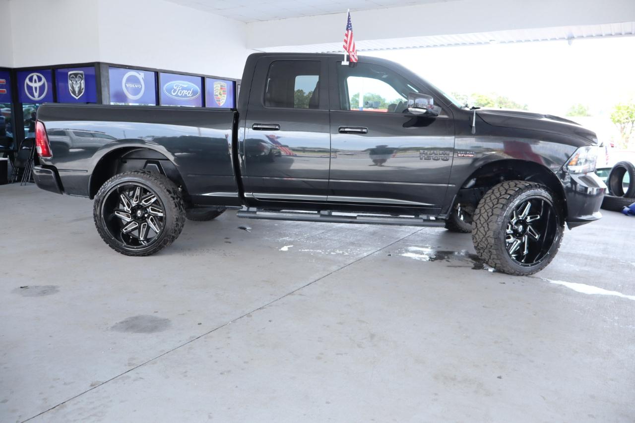 RAM 1500 4WD Quad Cab 140.5" Sport 2016