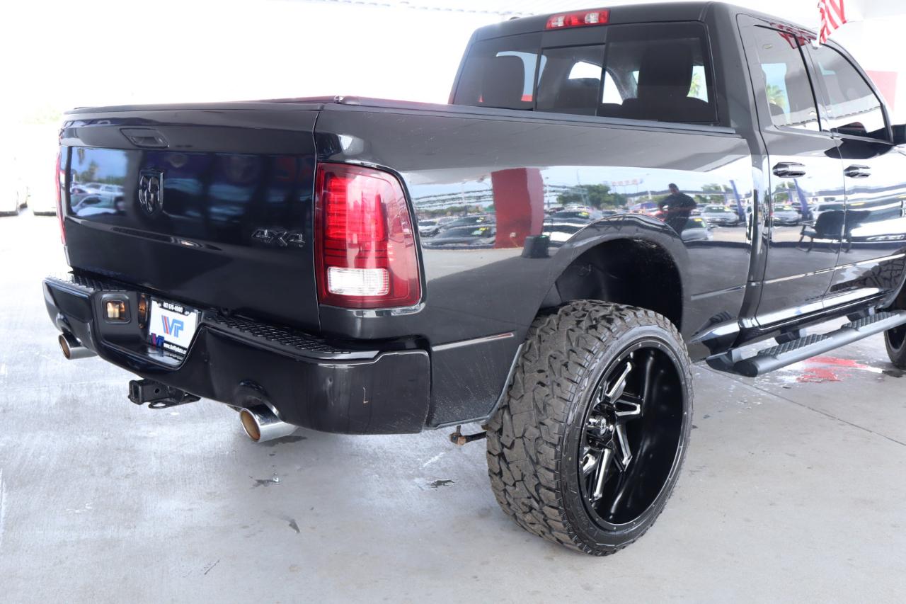 RAM 1500 4WD Quad Cab 140.5" Sport 2016