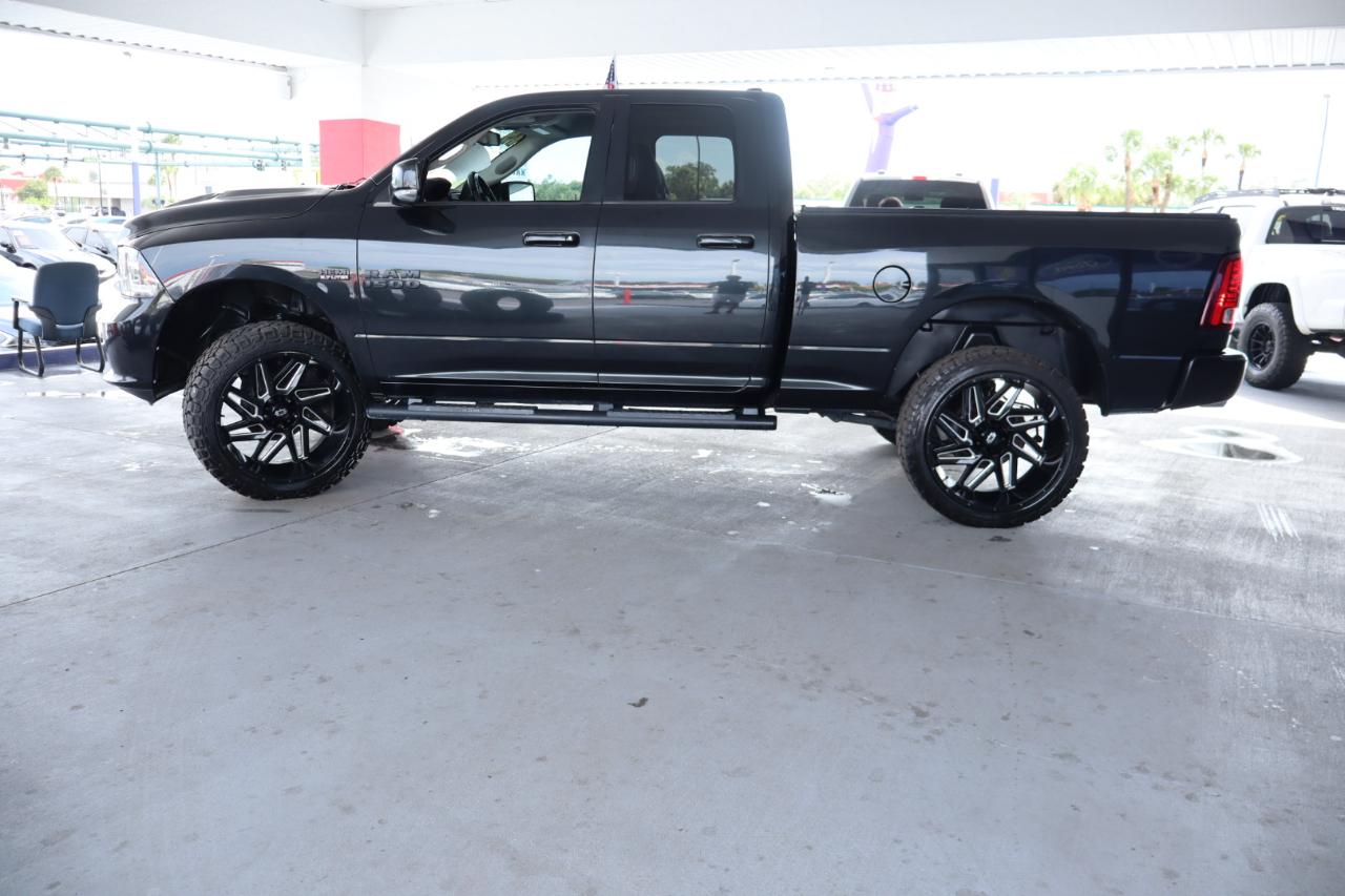 RAM 1500 4WD Quad Cab 140.5" Sport 2016