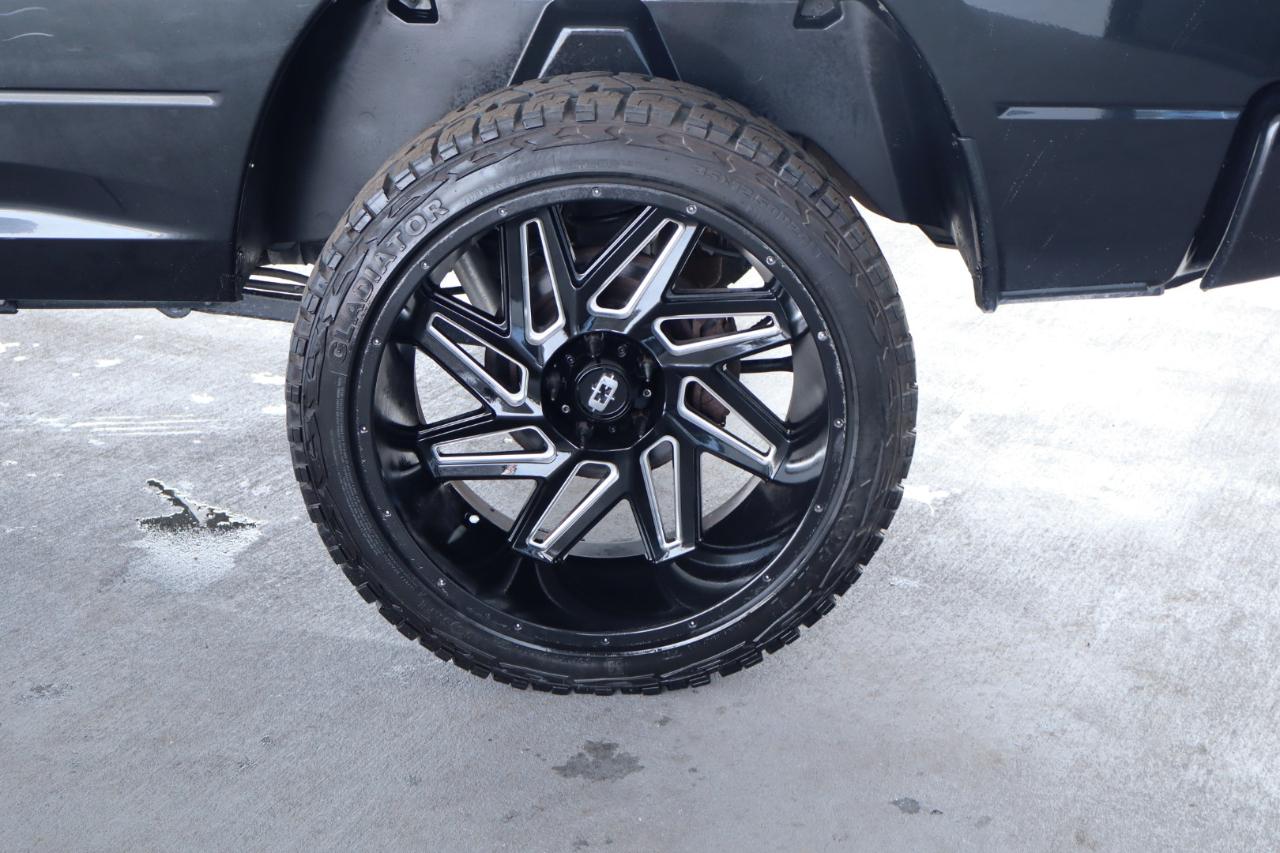 RAM 1500 4WD Quad Cab 140.5" Sport 2016