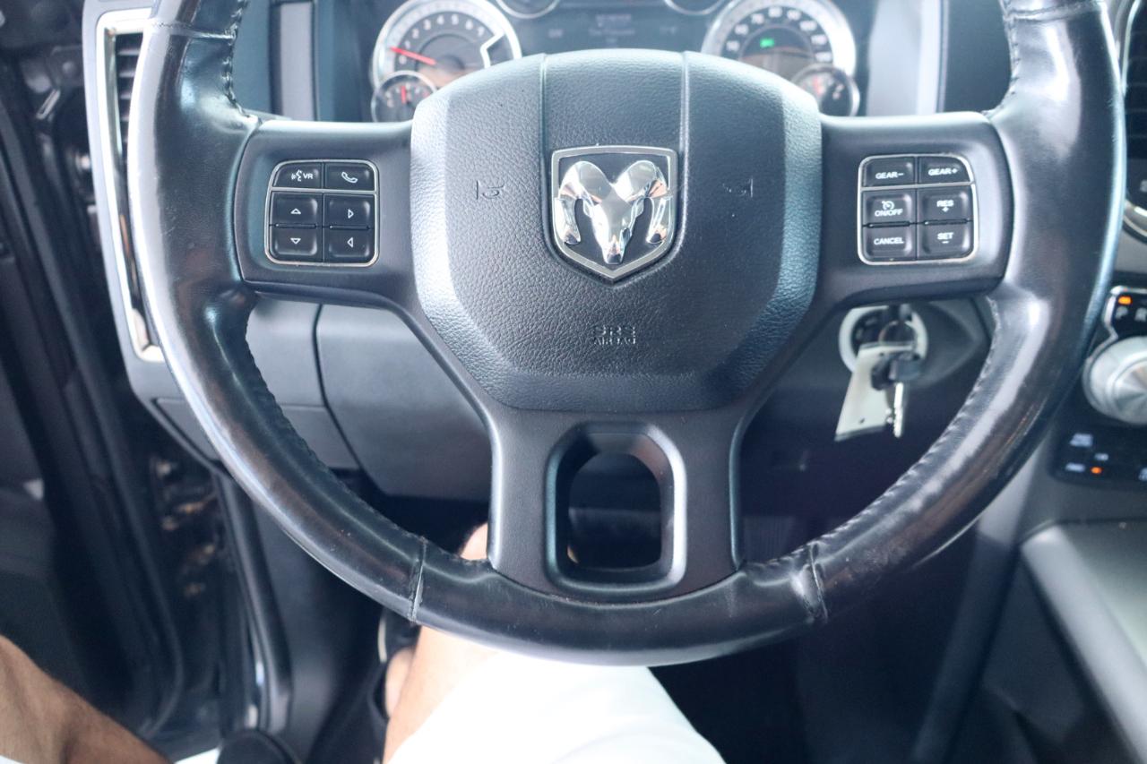 RAM 1500 4WD Quad Cab 140.5" Sport 2016