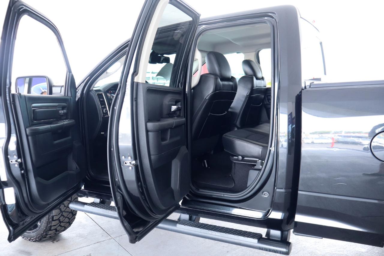 RAM 1500 4WD Quad Cab 140.5" Sport 2016