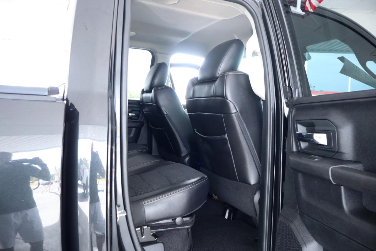 RAM 1500 4WD Quad Cab 140.5" Sport 2016