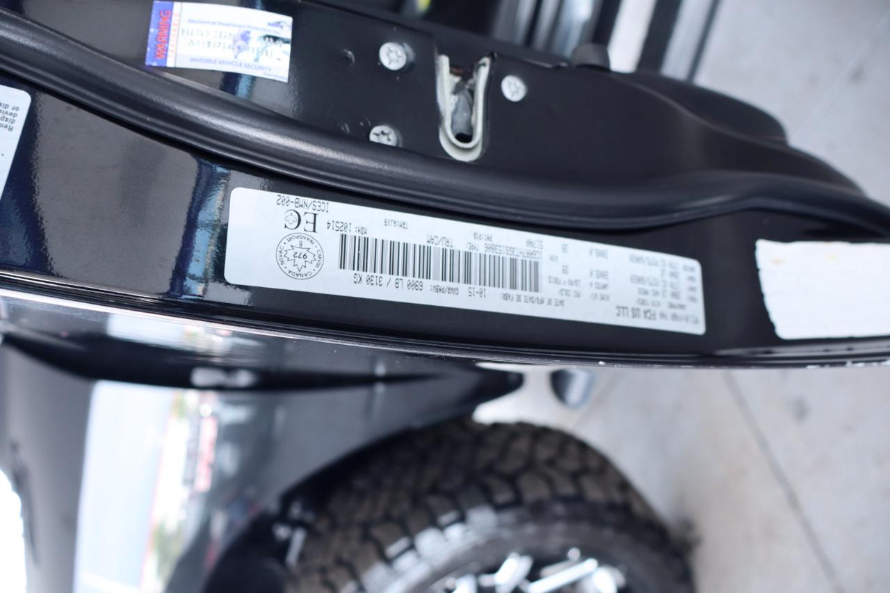 RAM 1500 4WD Quad Cab 140.5" Sport 2016