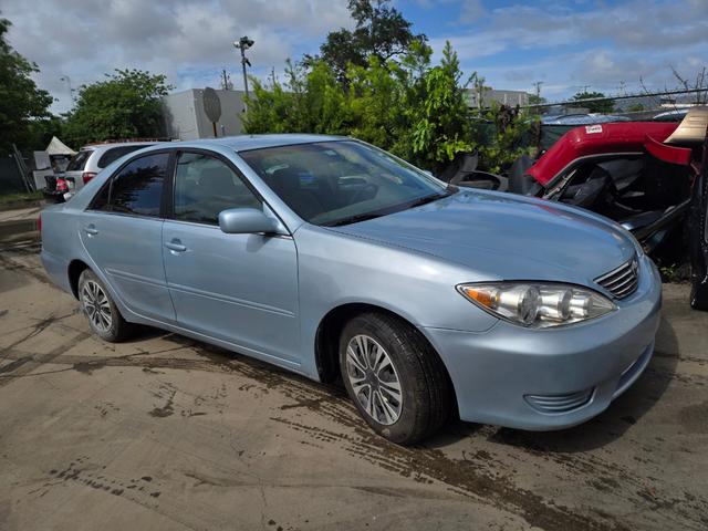 light blue 2005 Toyota Camry LE FWD Sedan Front-Wheel Drive Automatic