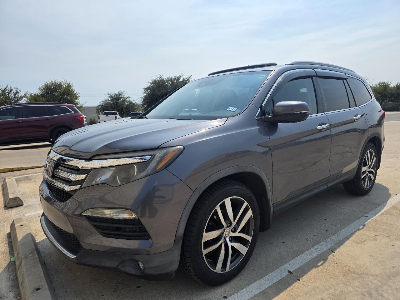 Honda Pilot 2WD 4dr Touring w/RES & Navi 2016