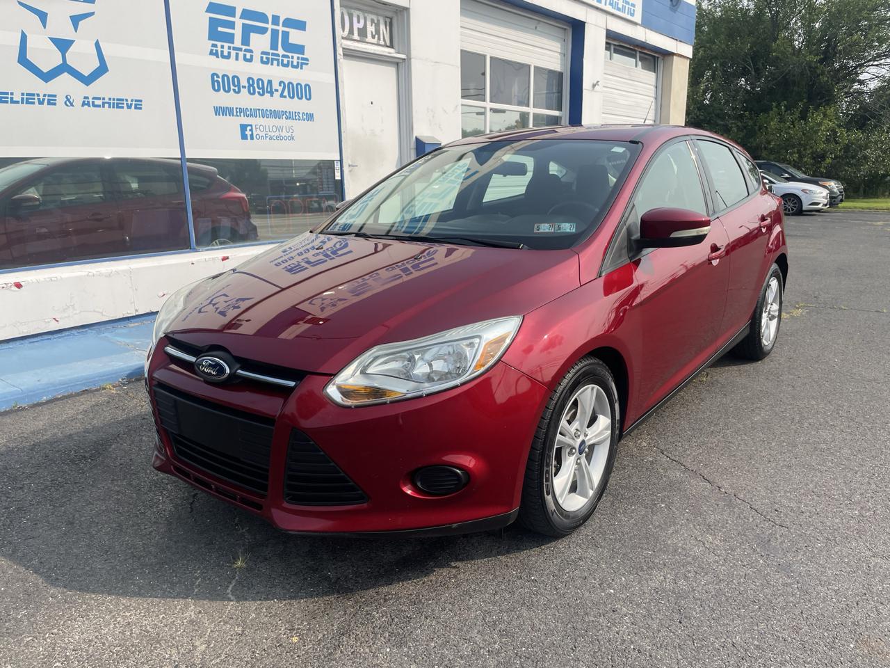 Red 2013 Ford Focus Hatchback Front-Wheel Drive 6-Speed Automatic