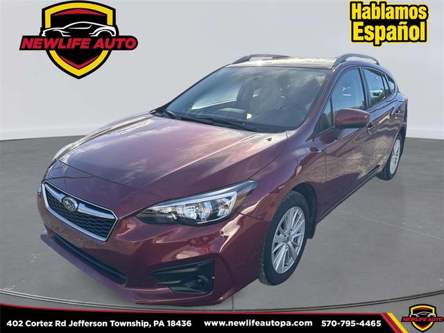 Red 2017 Subaru Impreza Hatchback All-Wheel Drive Continuously Variable Transmission