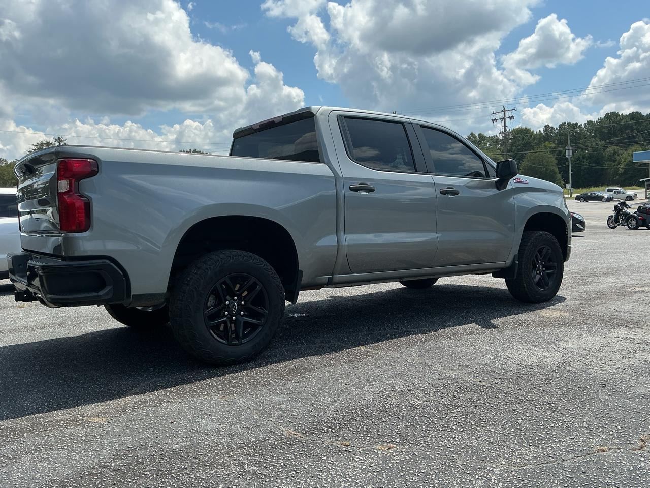 Chevrolet Silverado 1500 4WD Crew Cab 147" Custom Trail Boss 2024