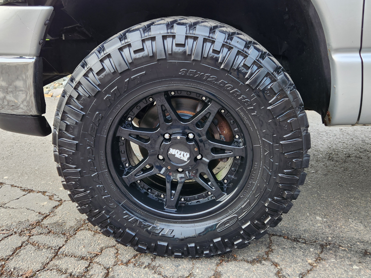 Dodge Ram 1500 4dr Quad Cab 140.5" WB 4WD SLT 2004