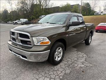 2012 RAM 1500 4WD Quad Cab 140.5" SLT