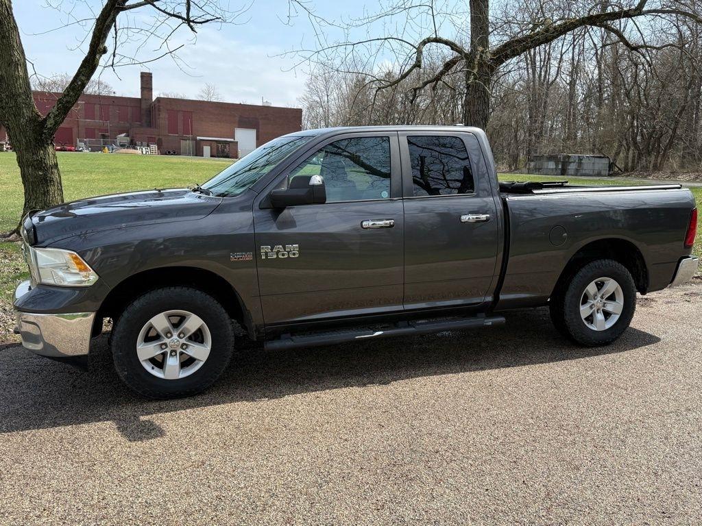 RAM 1500 4WD Quad Cab 140.5" SLT 2017