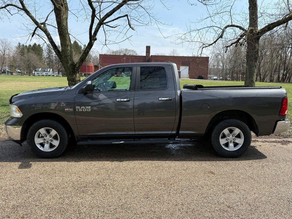RAM 1500 4WD Quad Cab 140.5" SLT 2017