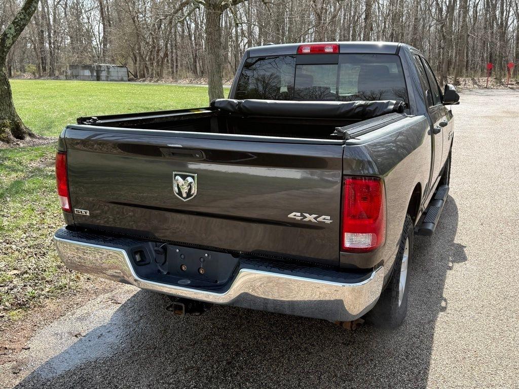RAM 1500 4WD Quad Cab 140.5" SLT 2017