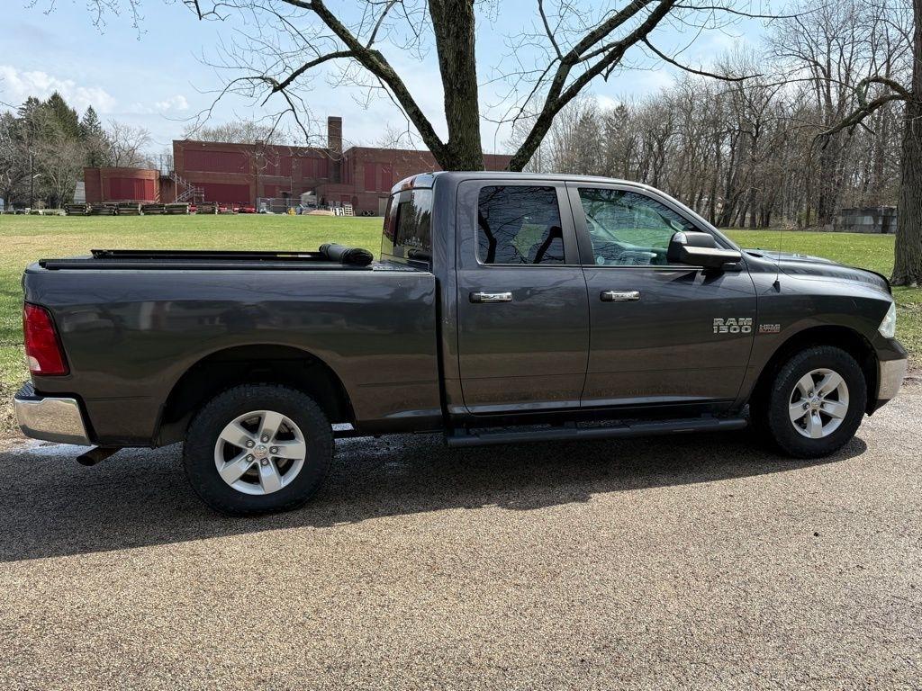 RAM 1500 4WD Quad Cab 140.5" SLT 2017