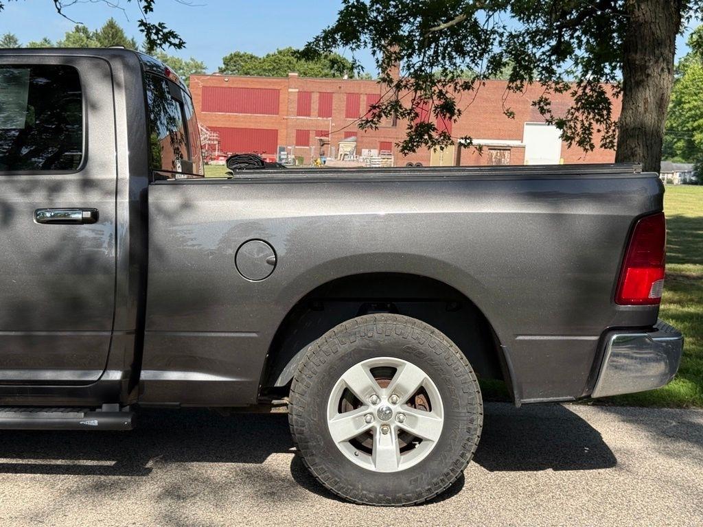 RAM 1500 4WD Quad Cab 140.5" SLT 2017