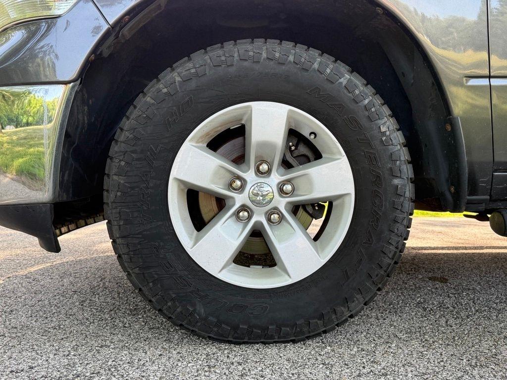 RAM 1500 4WD Quad Cab 140.5" SLT 2017