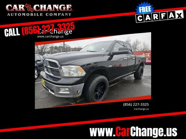 Black 2010 Dodge RAM 1500 SLT Quad Cab 4WD Pickup Truck Four-Wheel Drive 5-Speed Automatic