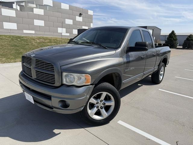 Silver 2005 Dodge RAM 1500 ST Quad Cab 4WD Pickup Truck Four-Wheel Drive Automatic