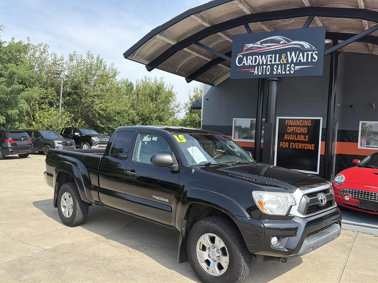 Black 2015 Toyota Tacoma Pickup Truck Four-Wheel Drive 6-Speed Manual