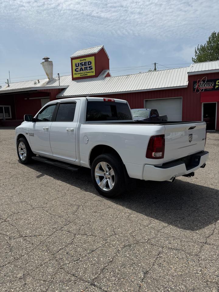 RAM 1500 4WD Crew Cab 140.5" Sport 2015