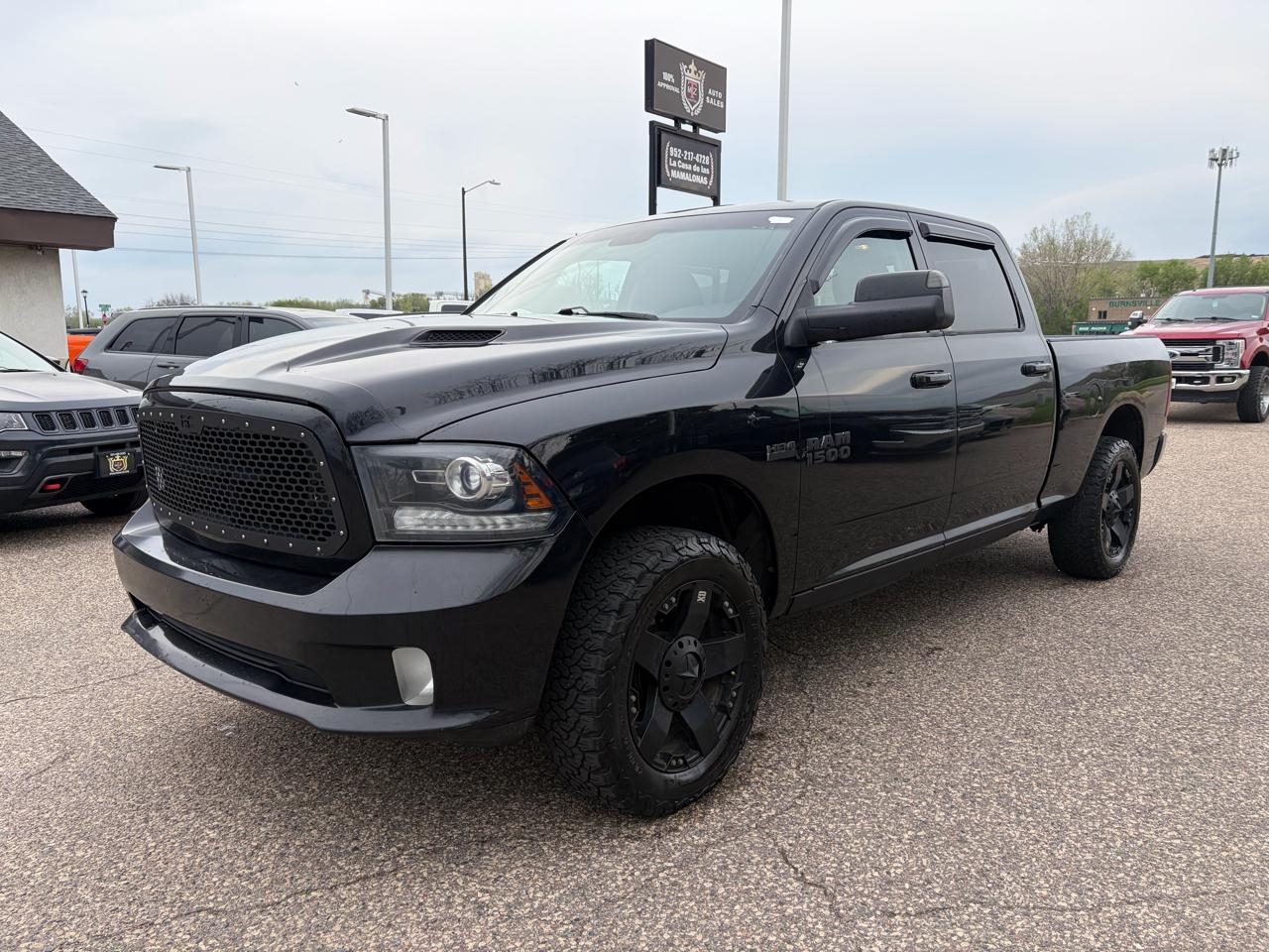 2016 RAM 1500 4WD Crew Cab 149" Sport