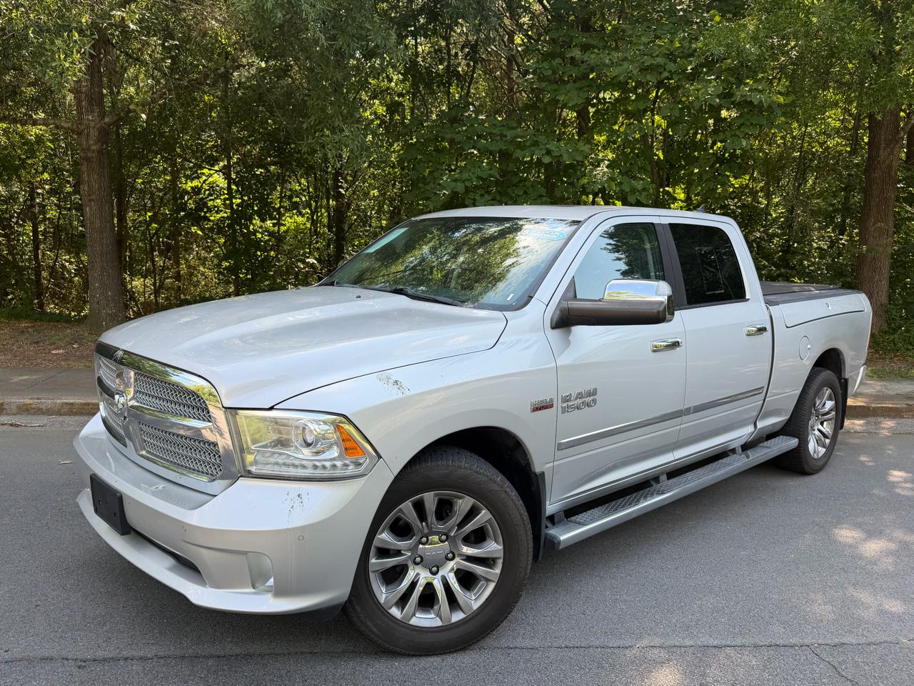 2014 RAM 1500 Laramie Limited 4x4 Crew Cab LWB's photo