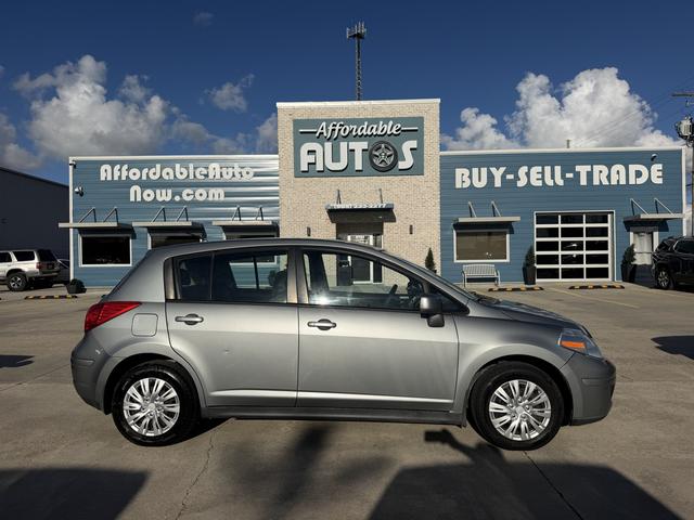 Silver 2010 Nissan Versa Hatchback Front-Wheel Drive 4-Speed Automatic