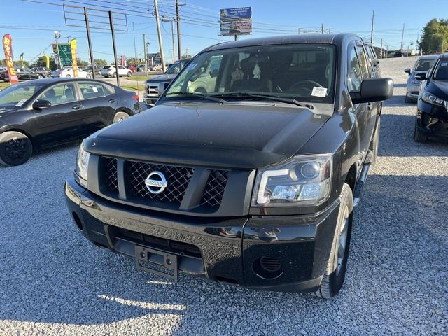 Black 2014 Nissan Titan Pickup Truck Four-Wheel Drive Automatic