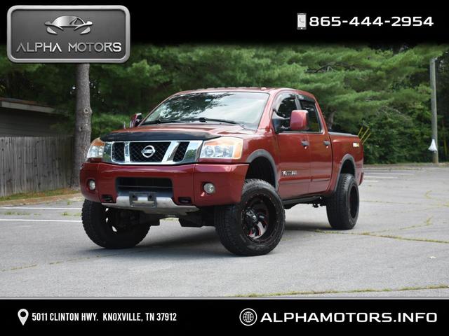 Red 2013 Nissan Titan Pickup Truck Four-Wheel Drive Automatic