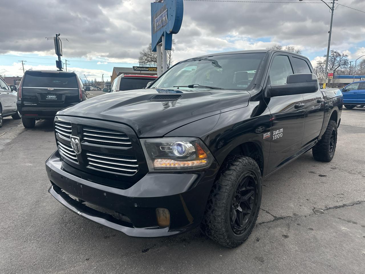 RAM 1500 4WD Crew Cab 140.5" Sport 2014