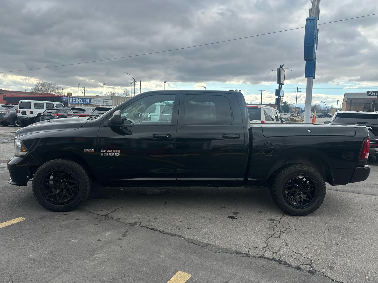 RAM 1500 4WD Crew Cab 140.5" Sport 2014
