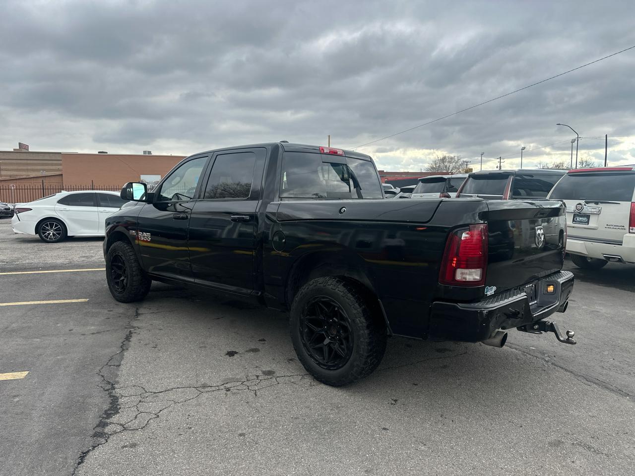 RAM 1500 4WD Crew Cab 140.5" Sport 2014