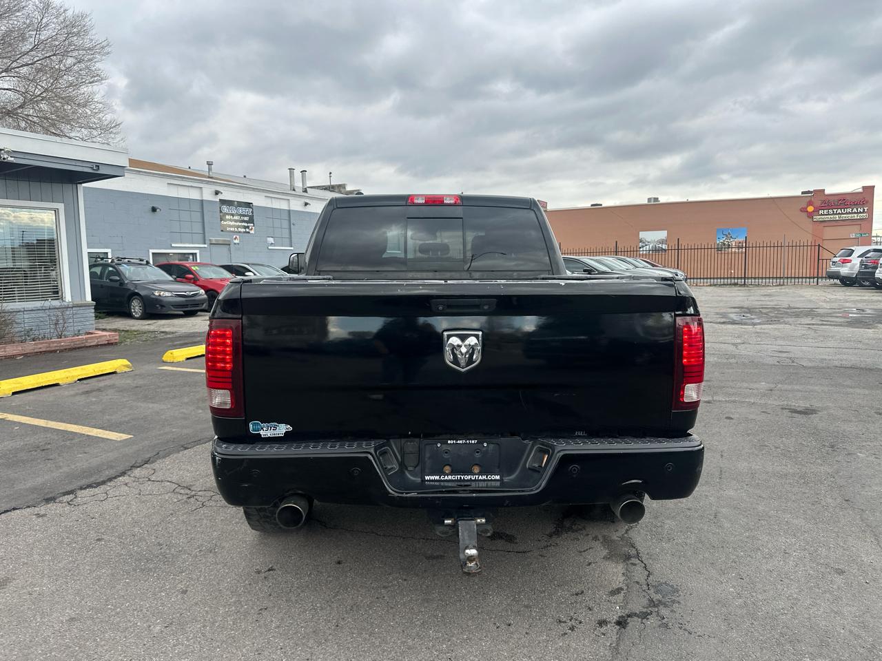 RAM 1500 4WD Crew Cab 140.5" Sport 2014