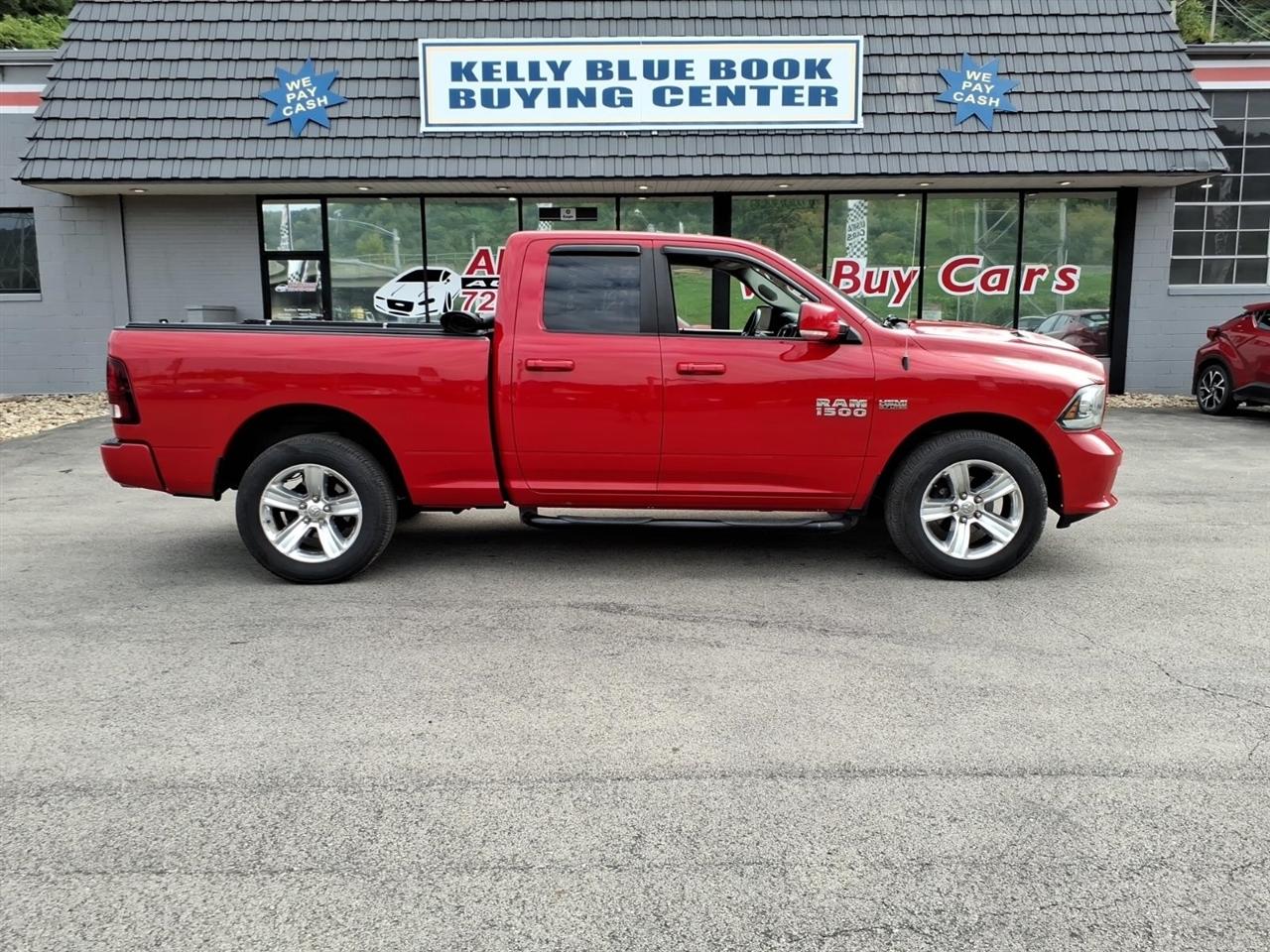 2015 RAM 1500 4WD Quad Cab 140.5" Sport