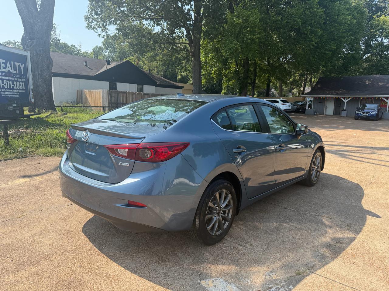 Mazda MAZDA3 I Grand Touring MT 4-Door 2016