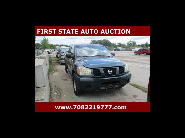 Green 2006 Nissan Titan Pickup Truck Four-Wheel Drive