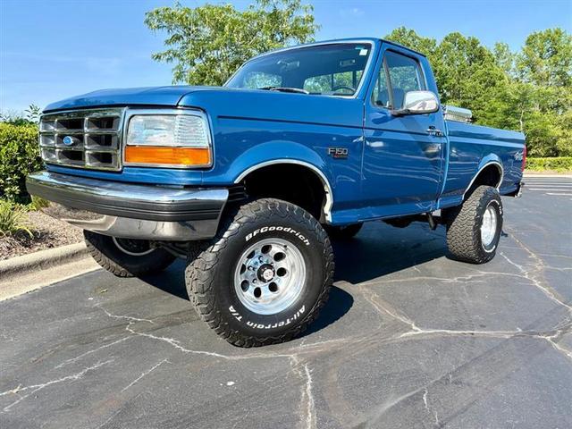 Blue 1992 Ford F-150 Pickup Truck Four-Wheel Drive Automatic