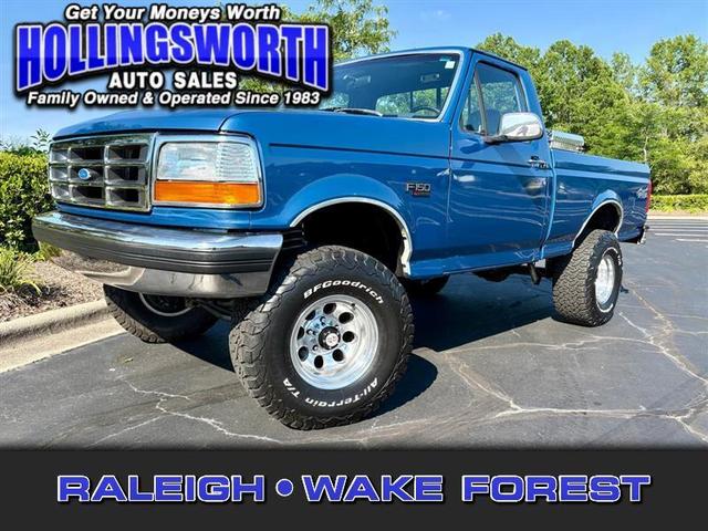 Blue 1992 Ford F-150 Pickup Truck Four-Wheel Drive Automatic