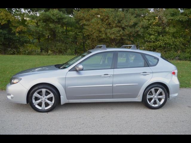 Silver 2011 Subaru Impreza Hatchback All-Wheel Drive Automatic